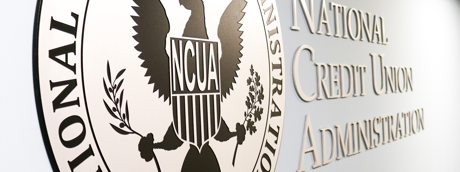 Image of the NCUA seal on a wall