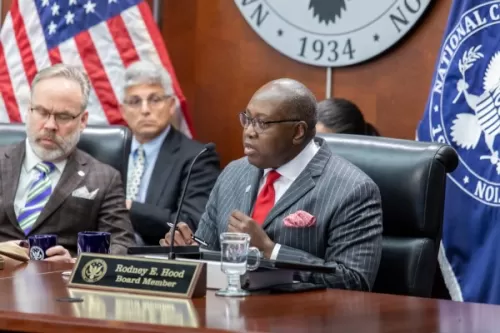 NCUA Board Member Rodney E. Hood asks the NCUA's Chief Financial Officer a question during the November 2022 Board Meeting.