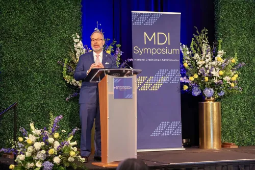 Todd M. Harper speaking at the 2024 MDI Symposium